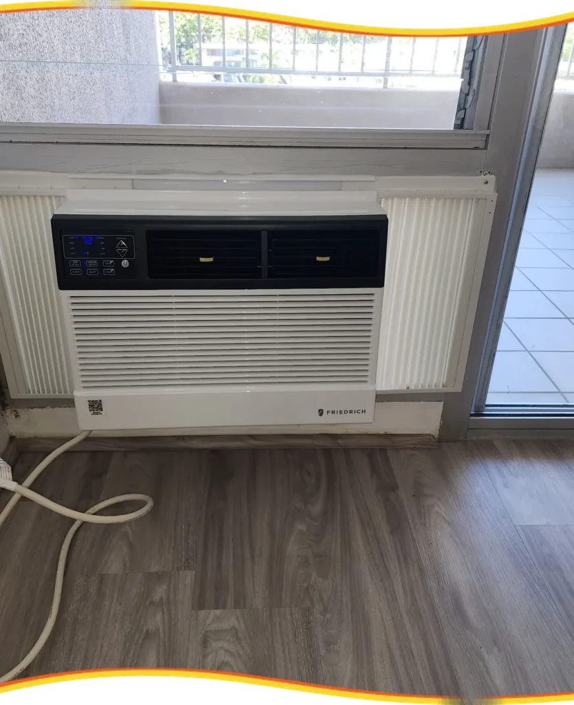 Kung Fu Air Service window AC unit installed in a room